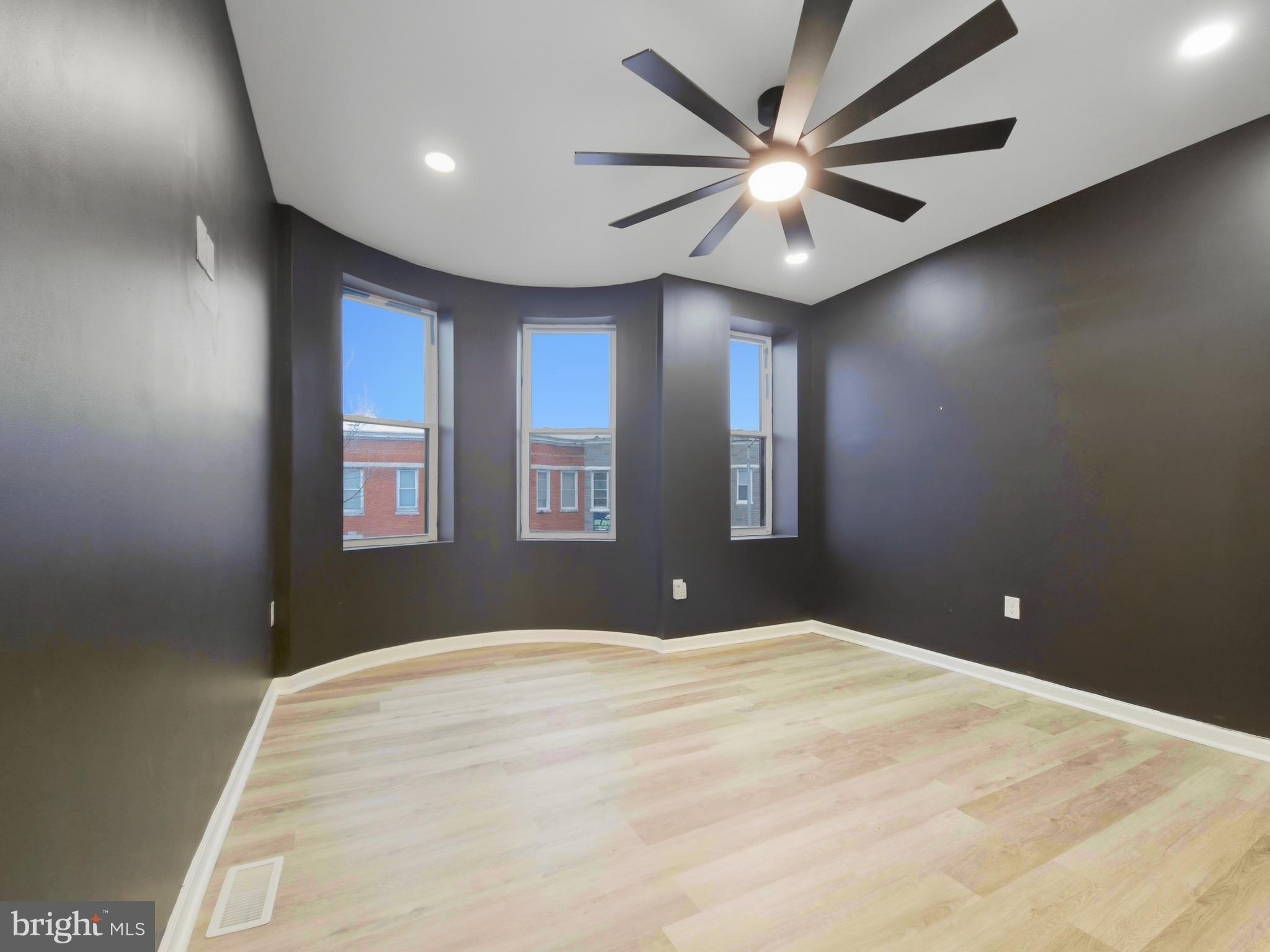 2321 McCulloh Street Baltimore, MD 21217 - Photo 13 of 29 a bedroom with ceiling fan and window