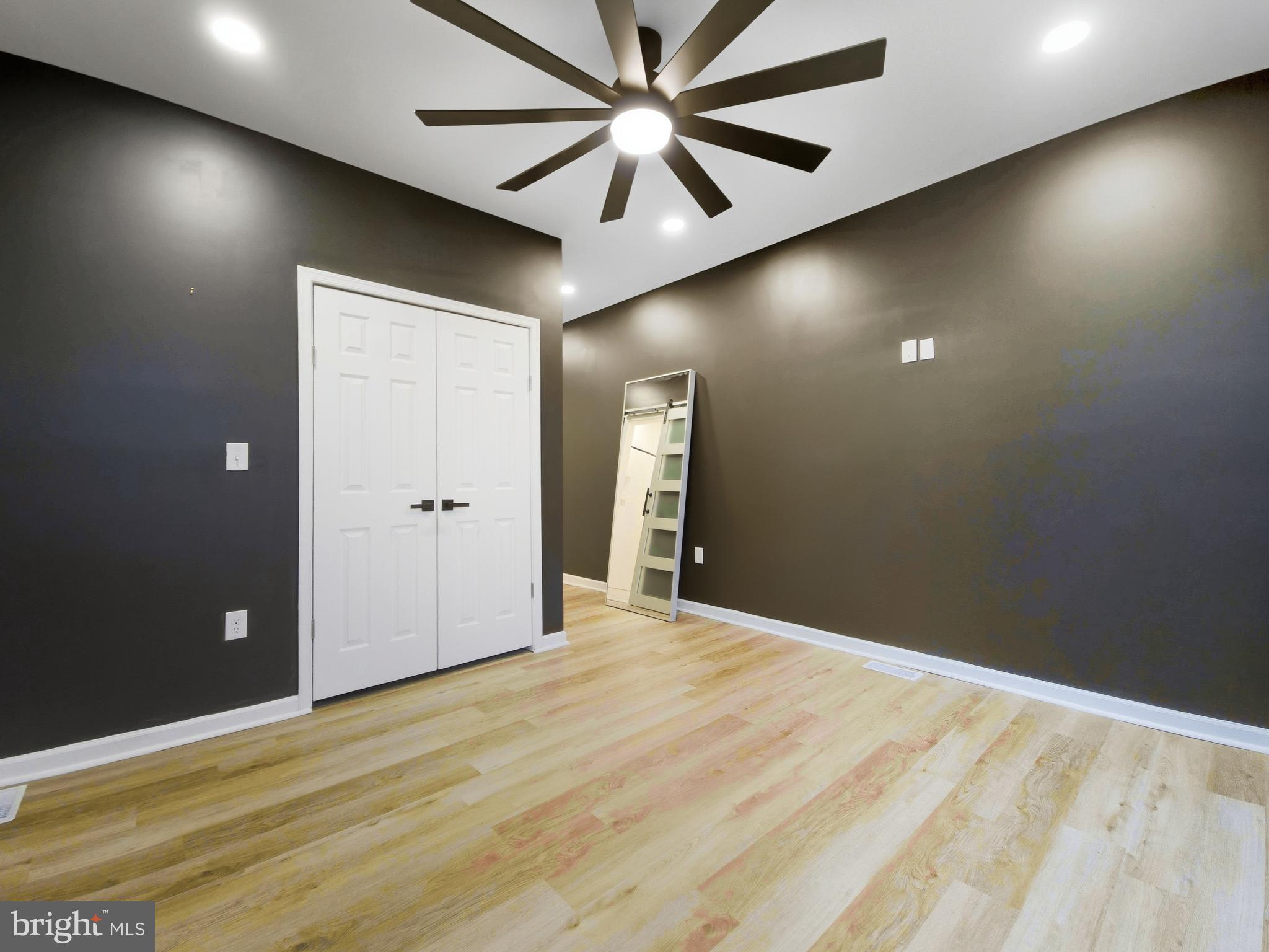 2321 McCulloh Street Baltimore, MD 21217 - Photo 14 of 29 an empty room with fan and entrance