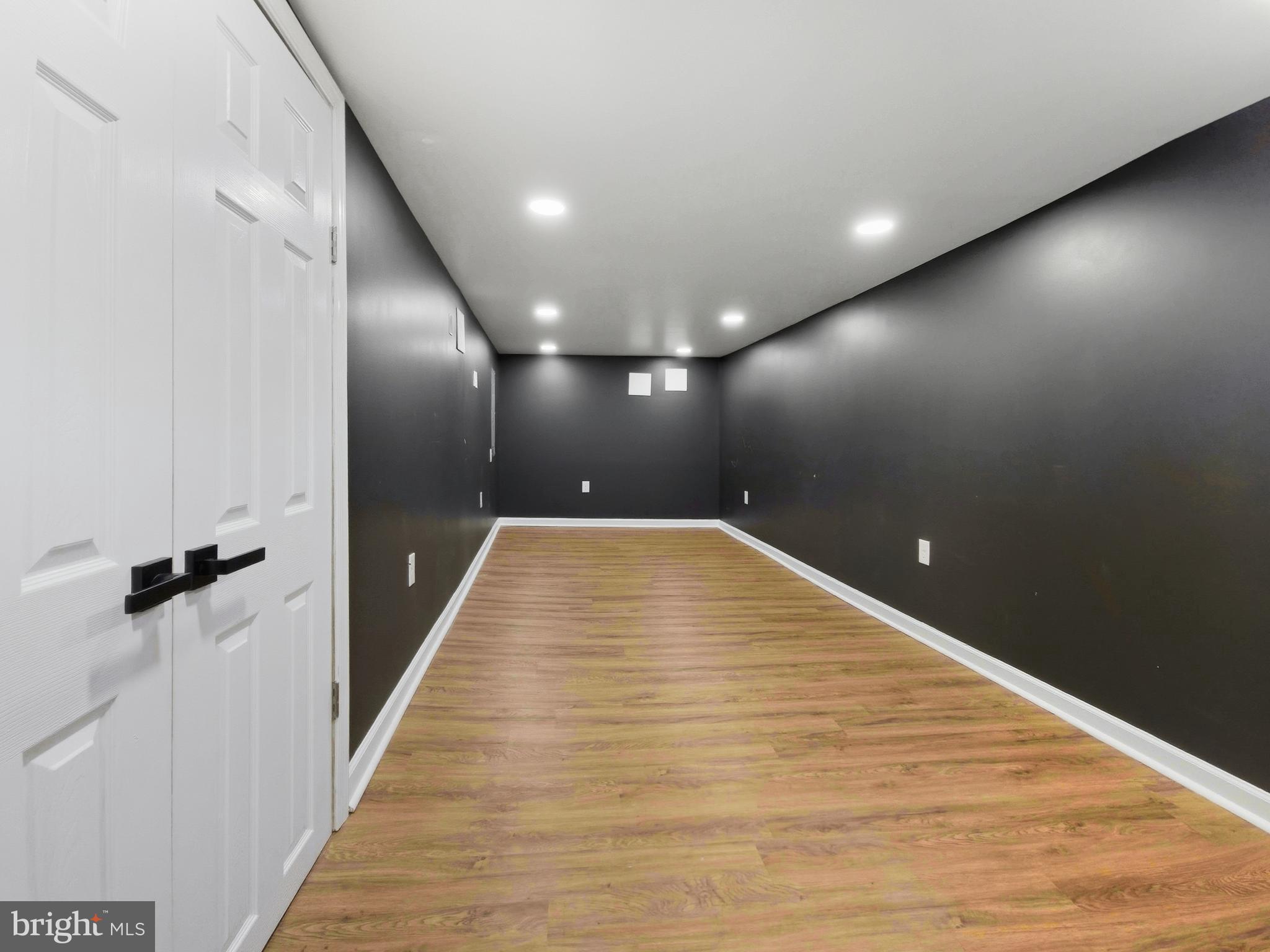 2321 McCulloh Street Baltimore, MD 21217 - Photo 24 of 29 an empty room with wooden floor