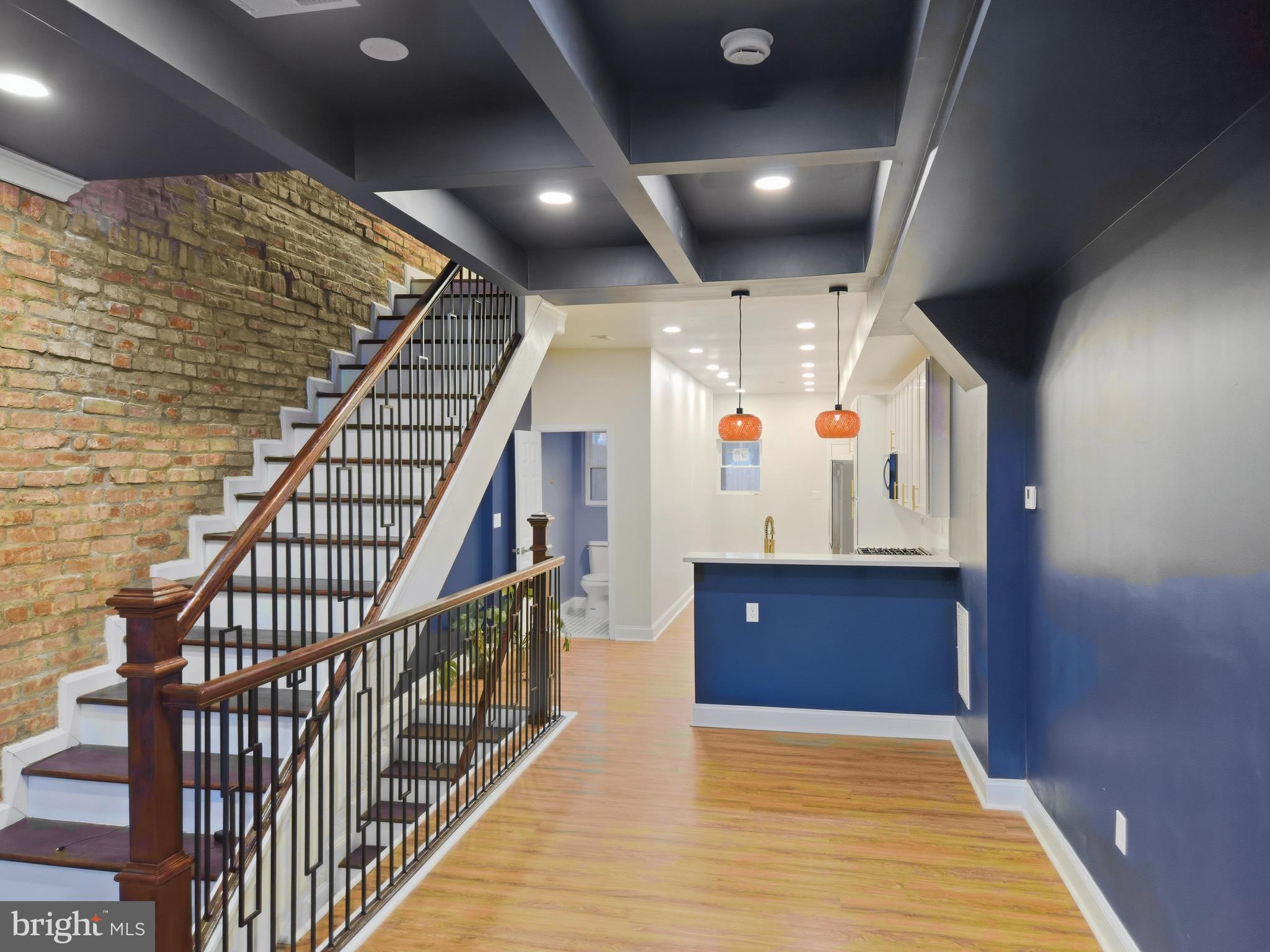 2321 McCulloh Street Baltimore, MD 21217 - Photo 4 of 29 a view of entryway hall and hall with wooden floor