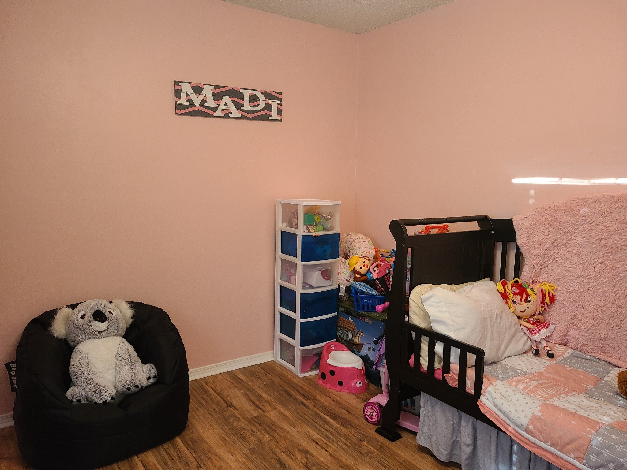 1800 Bee Spring Road Dellrose, TN 38453 - Photo 16 of 21 a bedroom with a bed and wooden floor