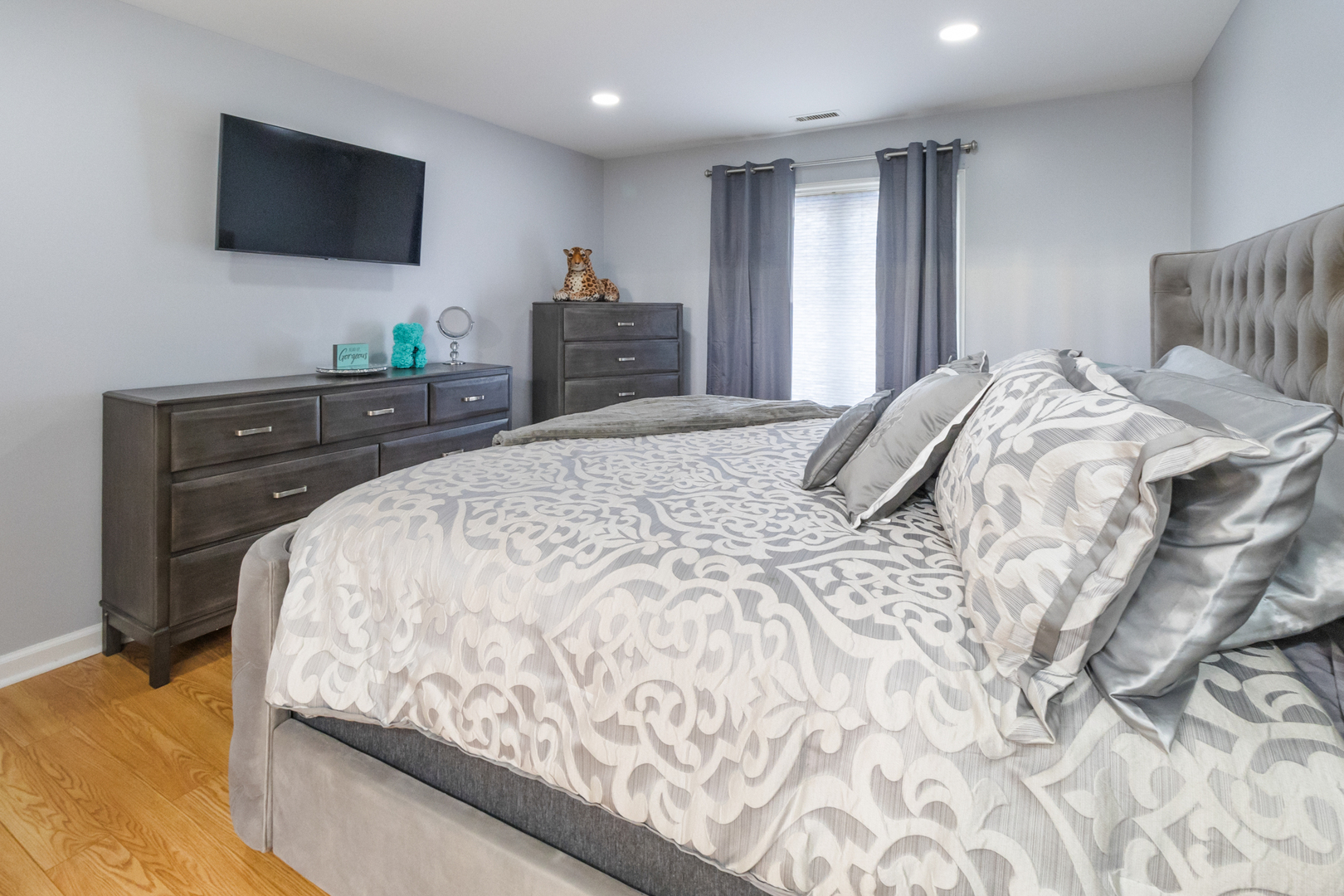 3427 Vollmer Road, Unit 205 Flossmoor, IL 60422 - Photo 11 of 30 a bedroom with a bed and a flat screen tv