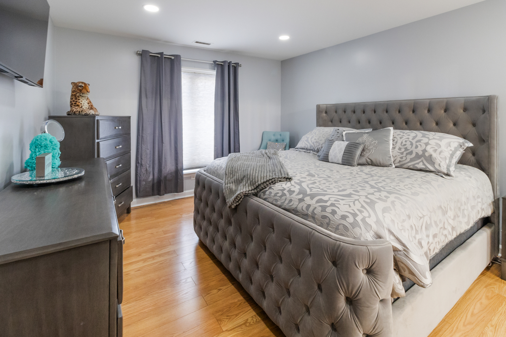 3427 Vollmer Road, Unit 205 Flossmoor, IL 60422 - Photo 12 of 30 a spacious bedroom with a bed and a wooden floor