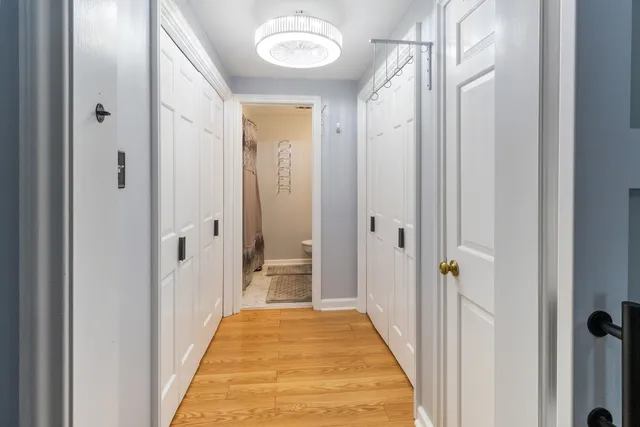 a view of a bathroom with a glass door