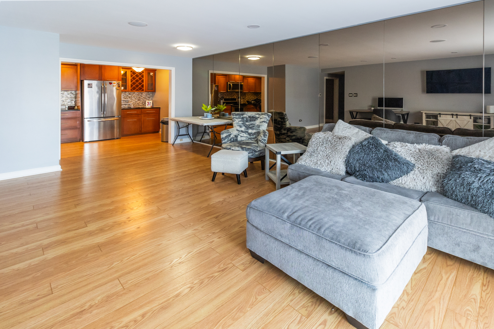 3427 Vollmer Road, Unit 205 Flossmoor, IL 60422 - Photo 3 of 30 a living room with furniture and large flat screen tv