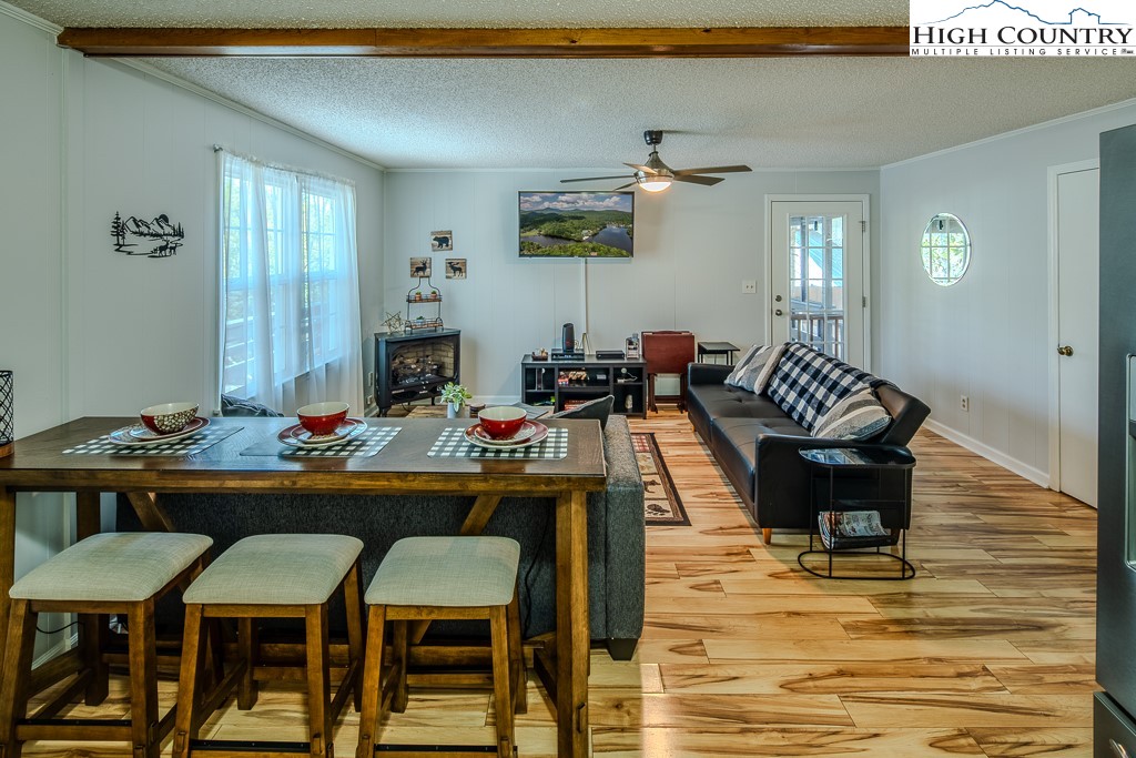 198 Black Pine Road Newland, NC 28657 - Photo 6 of 34 a dining room with furniture and window
