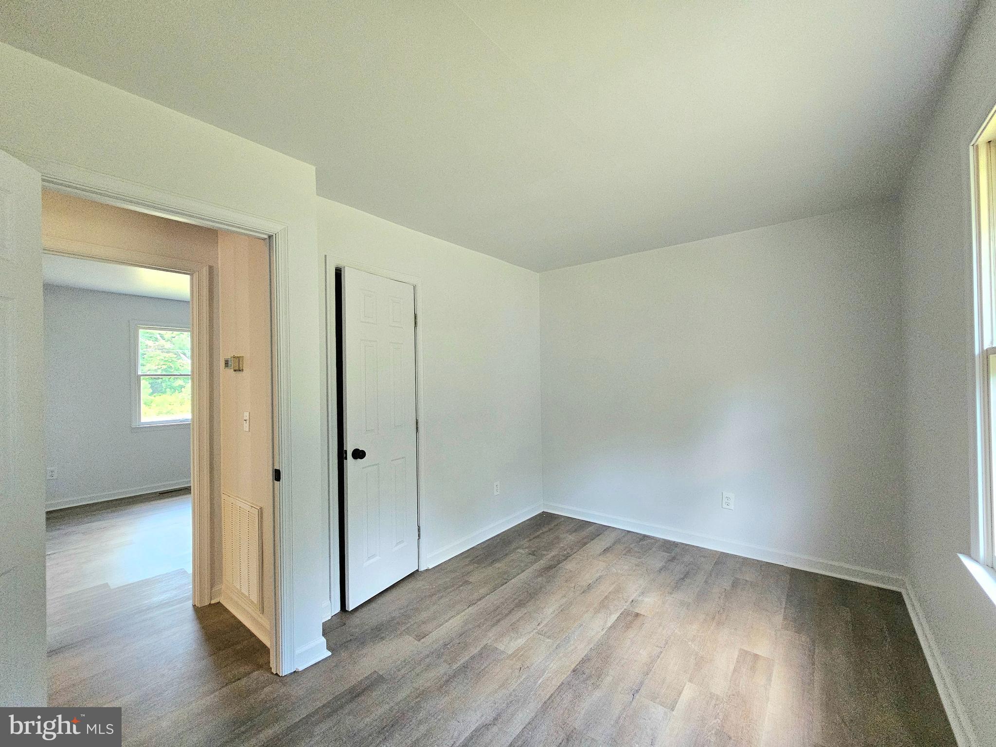 11285 Snethen Church Road Mardela Springs, MD 21837 - Photo 11 of 21 wooden floor in an empty room