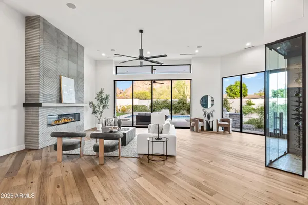 a living room with furniture and a large window