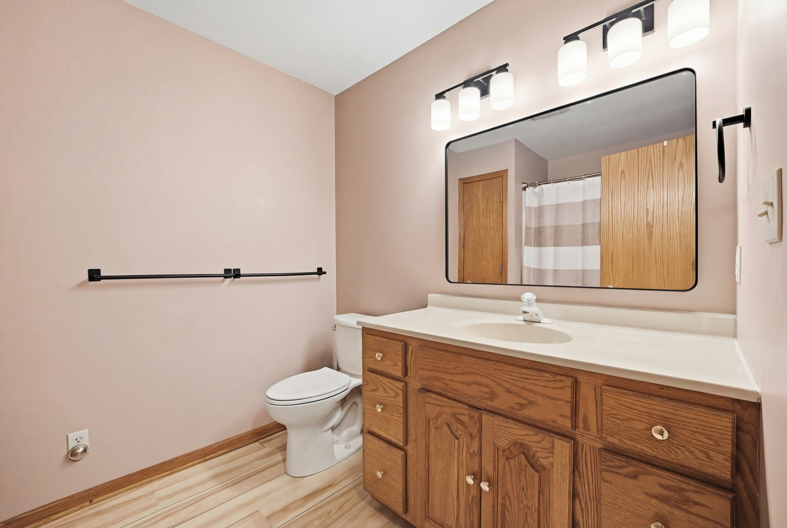 28007 Brickville Road Sycamore, IL 60178 - Photo 20 of 39 a bathroom with a toilet a sink and mirror