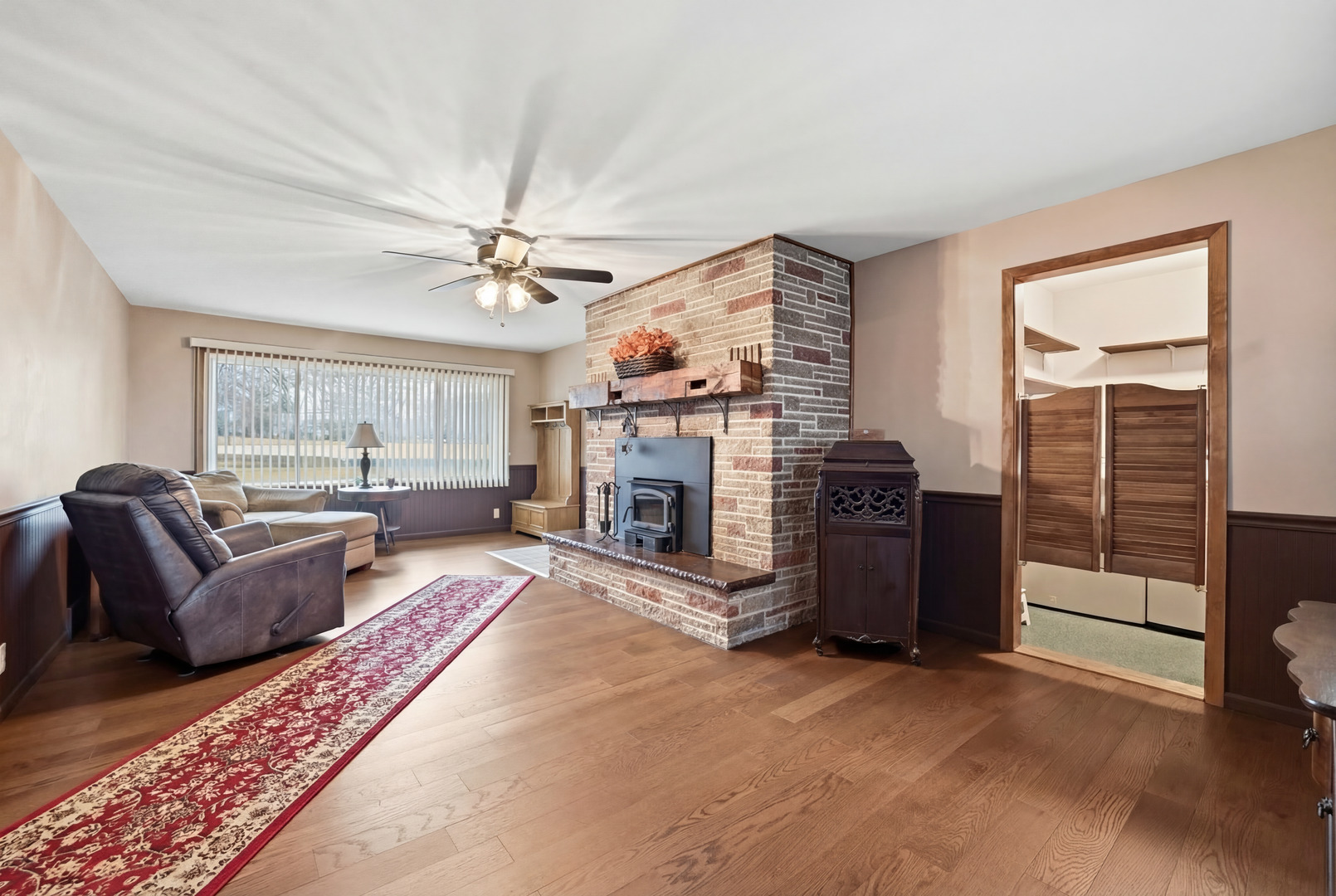 28007 Brickville Road Sycamore, IL 60178 - Photo 2 of 39 a living room with furniture and a fireplace