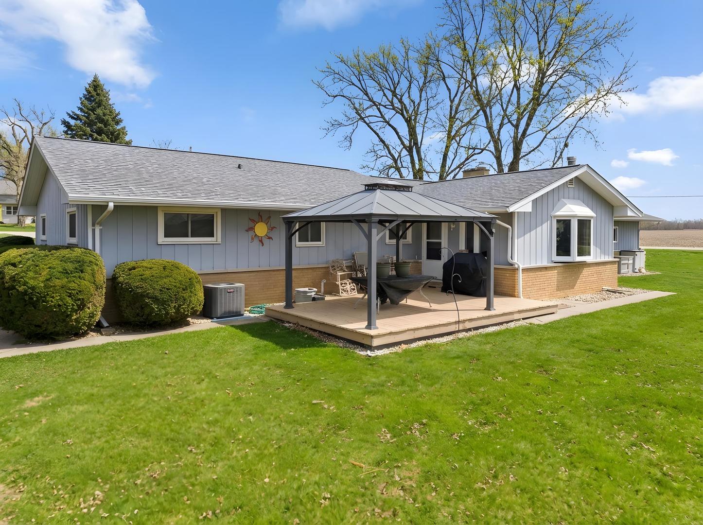 28007 Brickville Road Sycamore, IL 60178 - Photo 23 of 39 a view of a house with a yard patio and a patio