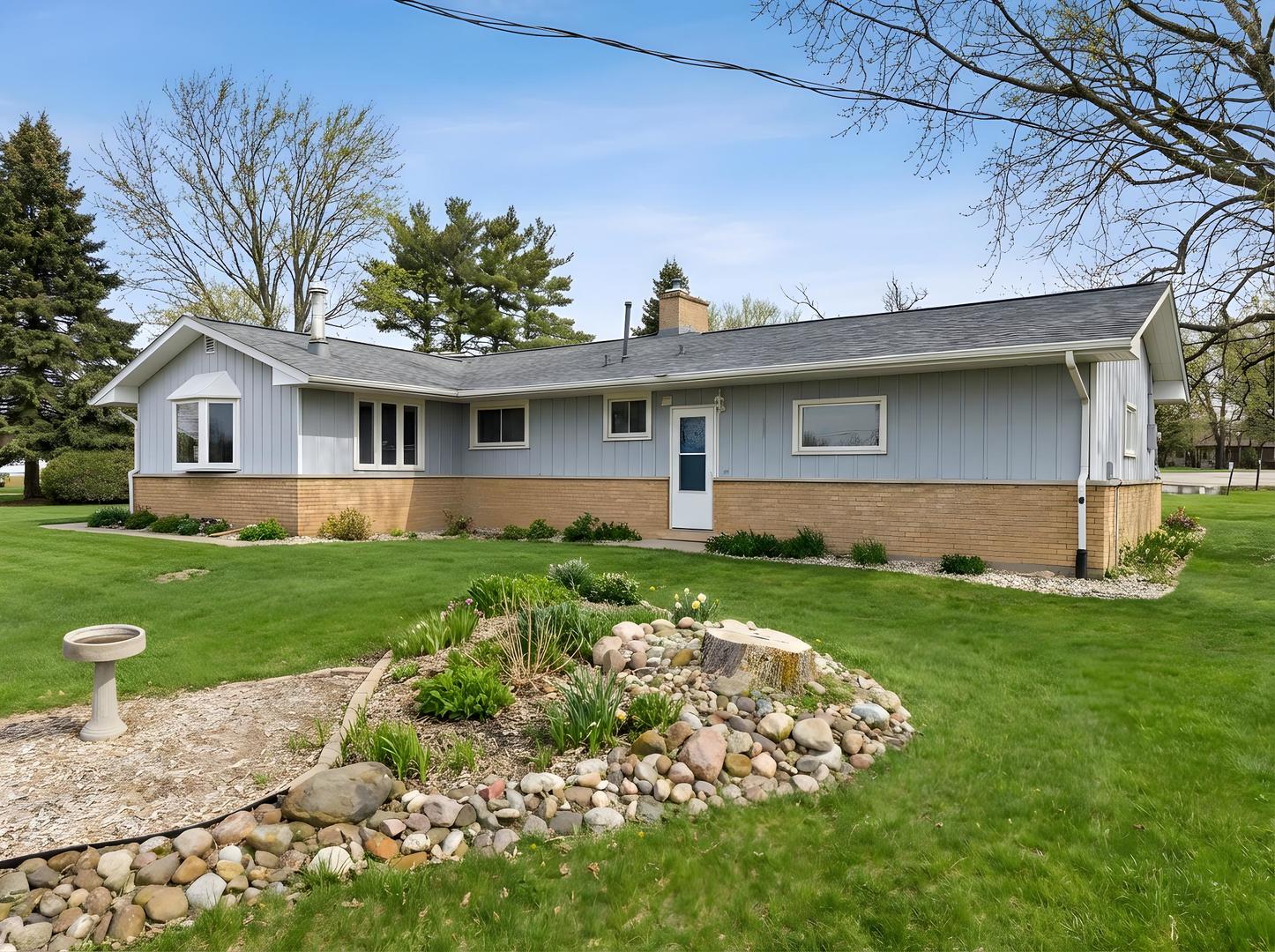 28007 Brickville Road Sycamore, IL 60178 - Photo 24 of 39 a front view of house with yard and green space