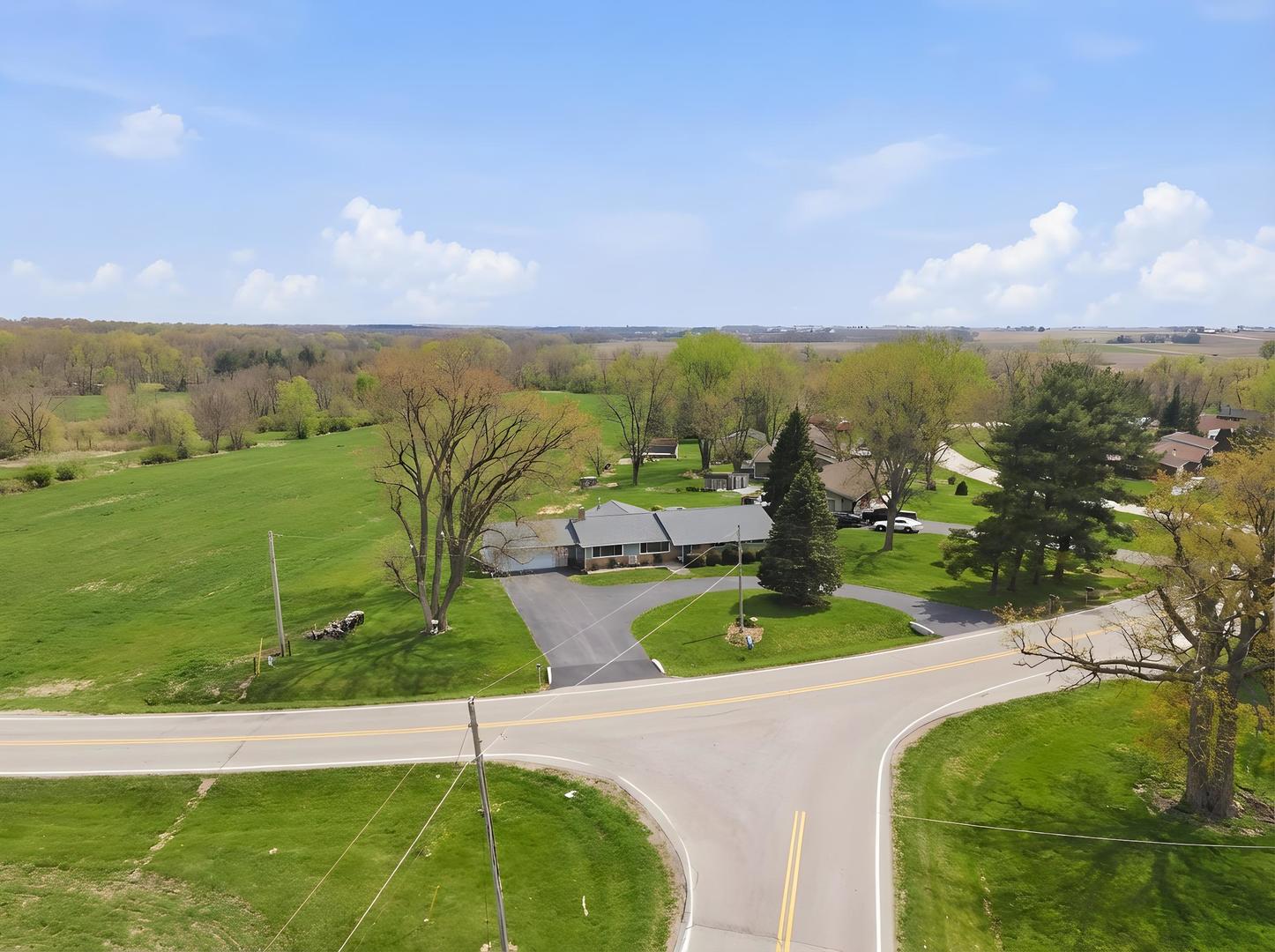 28007 Brickville Road Sycamore, IL 60178 - Photo 27 of 39 a view of a swimming pool with a yard