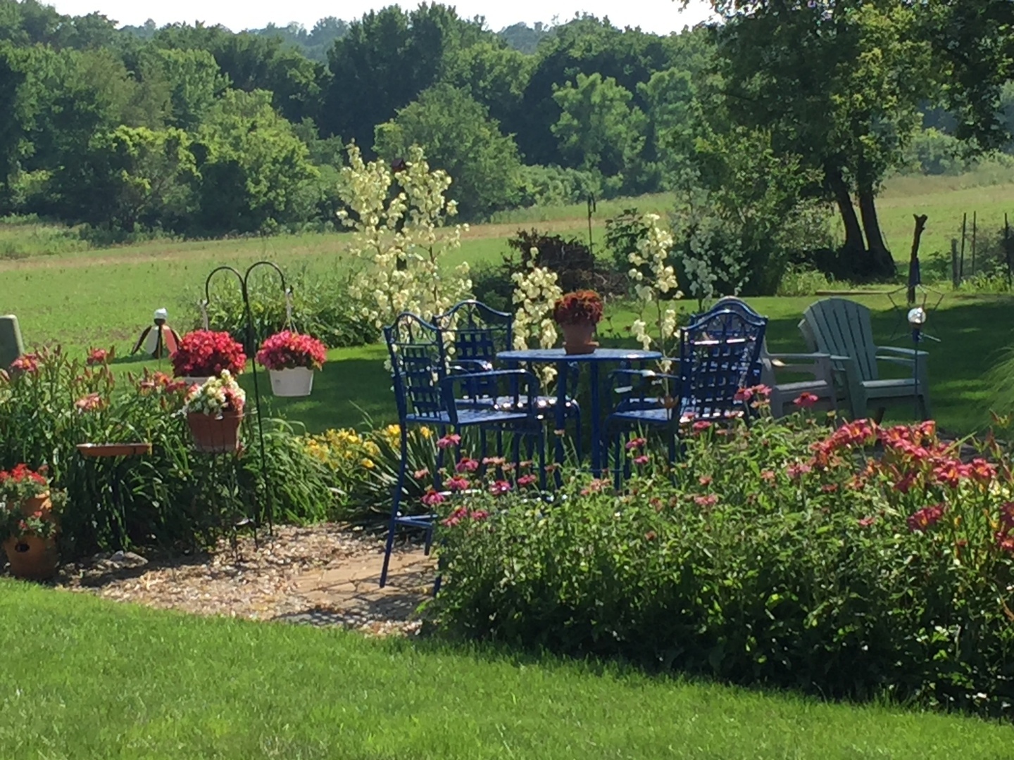 28007 Brickville Road Sycamore, IL 60178 - Photo 37 of 39 a view of a table and chairs in the garden