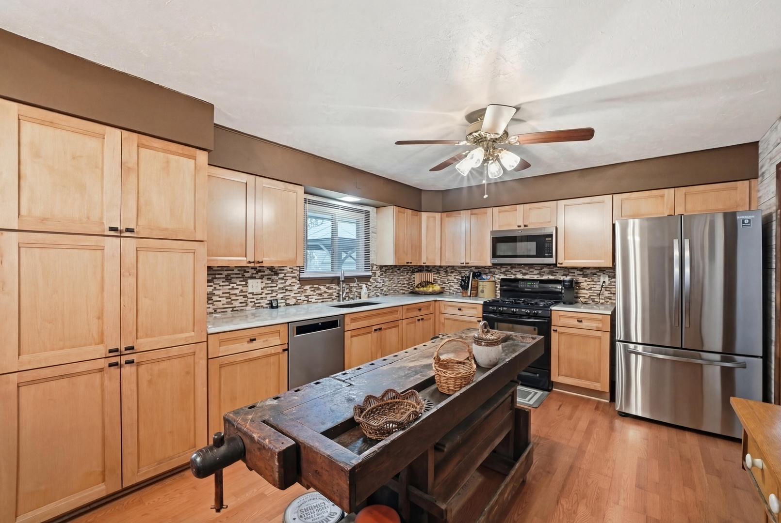 28007 Brickville Road Sycamore, IL 60178 - Photo 4 of 39 a kitchen with a refrigerator a sink and a stove top oven