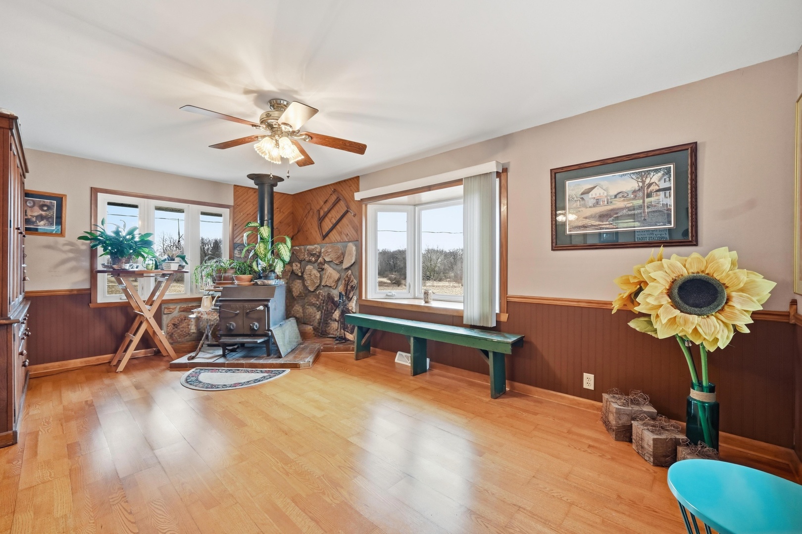 28007 Brickville Road Sycamore, IL 60178 - Photo 7 of 39 a living room with furniture and a large window