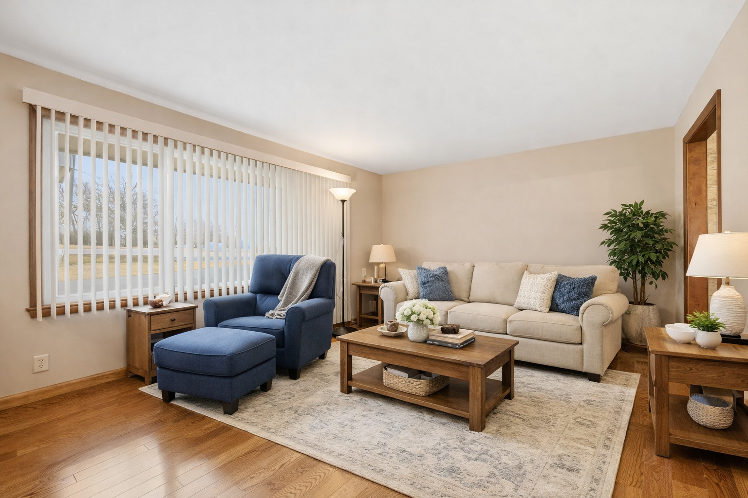 28007 Brickville Road Sycamore, IL 60178 - Photo 10 of 39 a living room with furniture and a large window