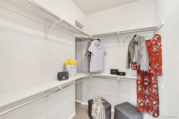 a bathroom with a shower and a sink