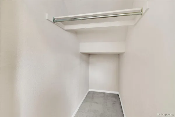a view of an empty walk in closet