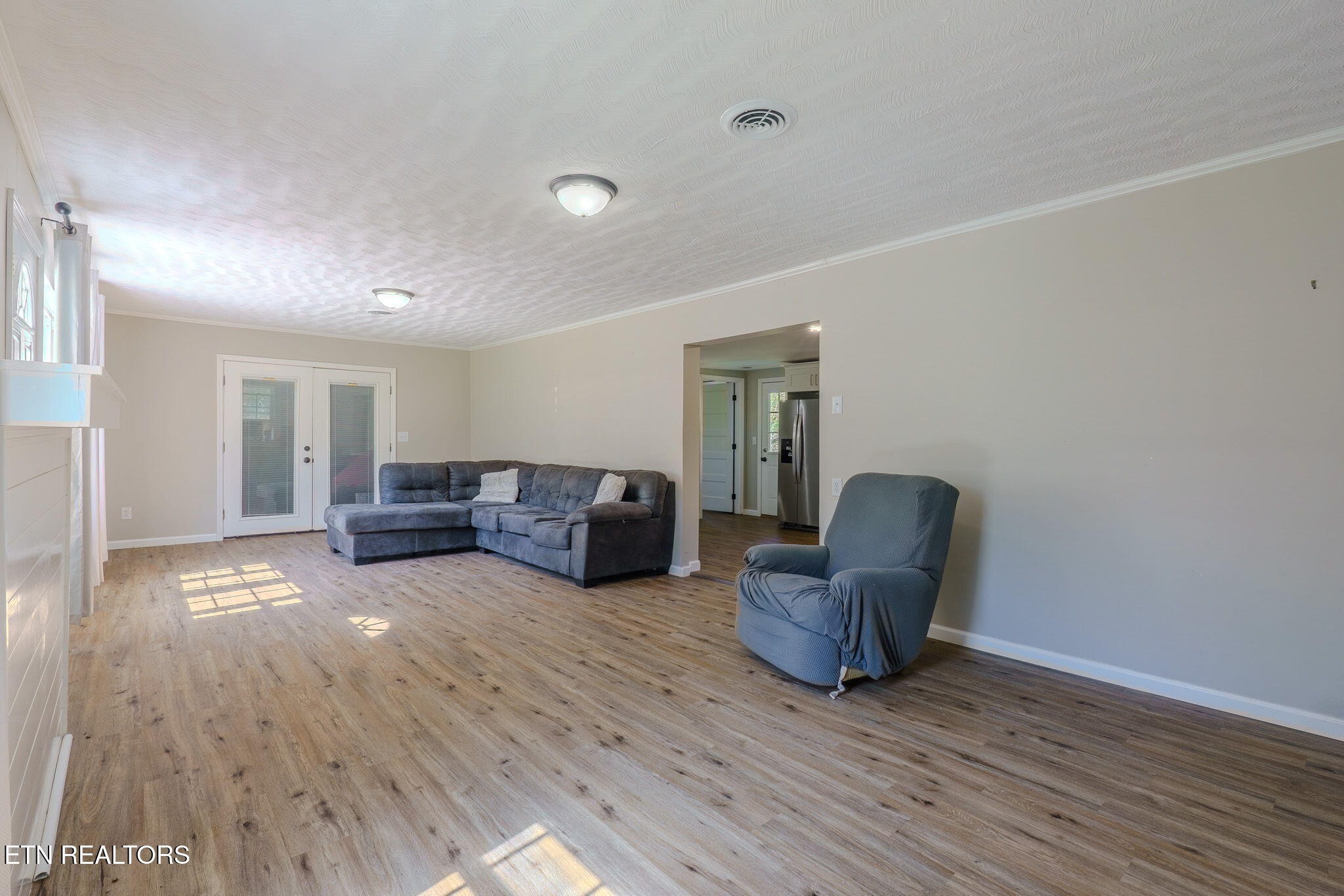 2331 Webb Road Sevierville, TN 37876 - Photo 5 of 23 a living room with furniture and a wooden floor