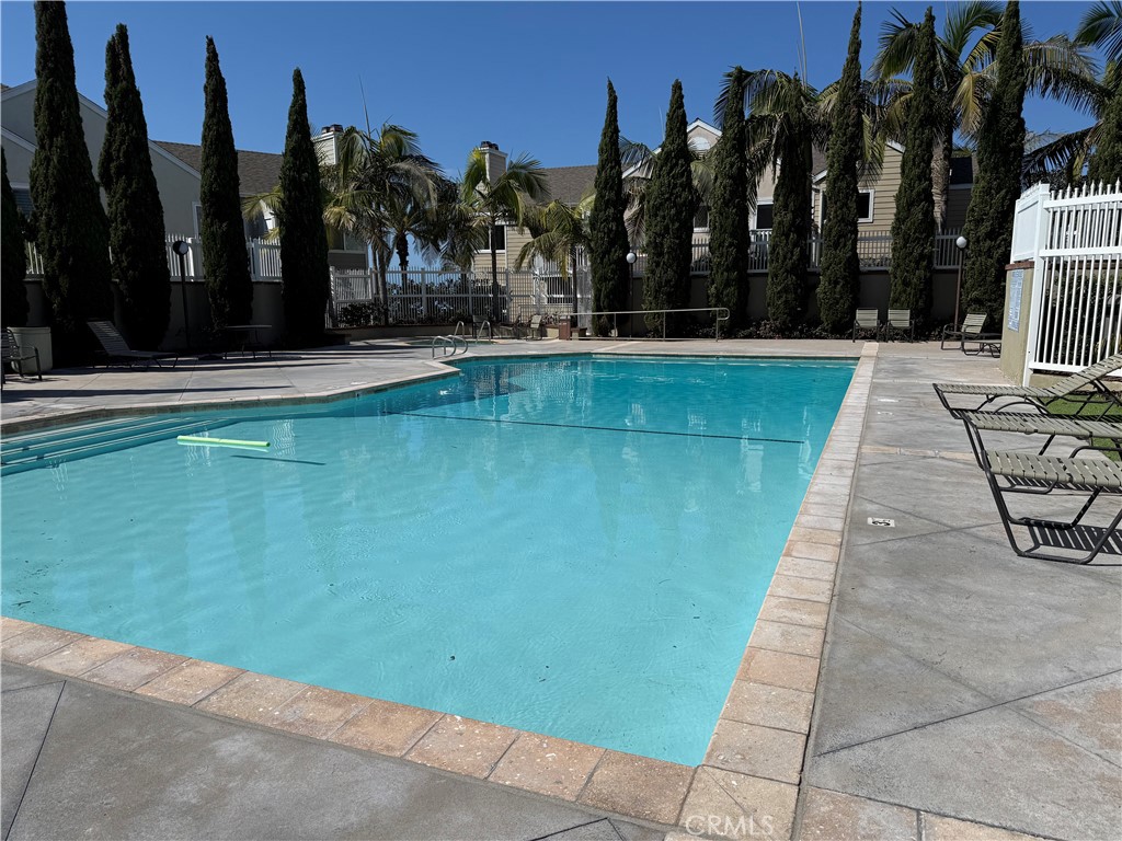 34134 Selva Road, Unit 248 Dana Point, CA 92629 - Photo 29 of 41 a view of swimming pool with palm trees