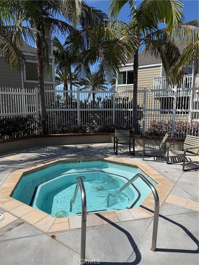 34134 Selva Road, Unit 248 Dana Point, CA 92629 - Photo 30 of 41 a view of a house with backyard and sitting area