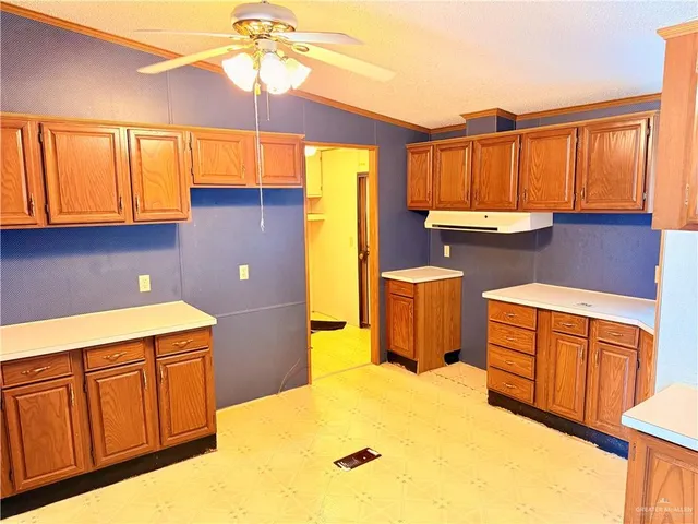 a bedroom with a bed and dresser