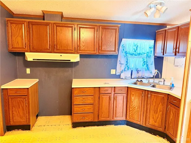 a dining room with furniture and a window