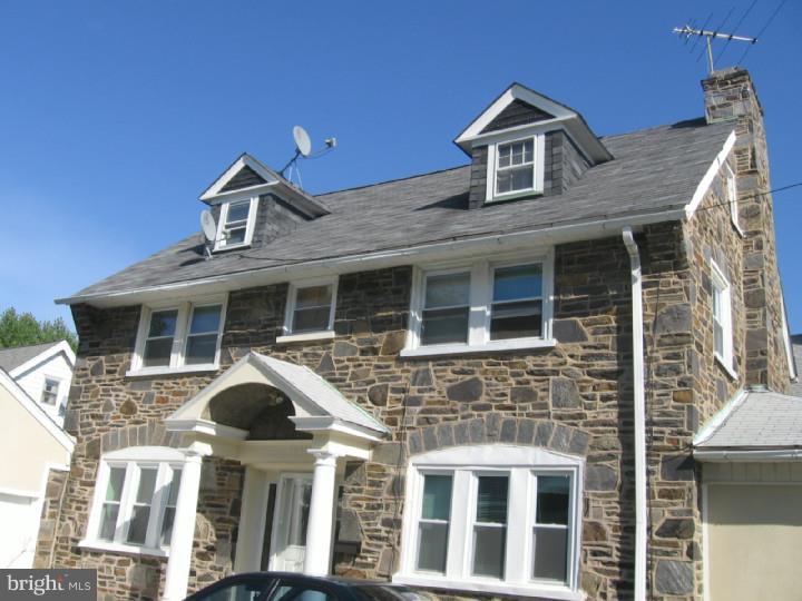 a front view of a house with balcony