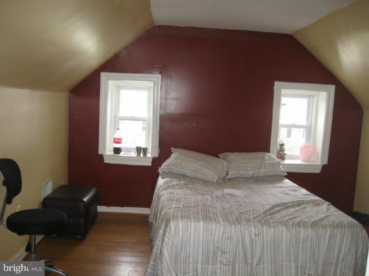 7007 Hilltop Road Upper Darby, PA 19082 - Photo 12 of 20 a bedroom with a bed and window