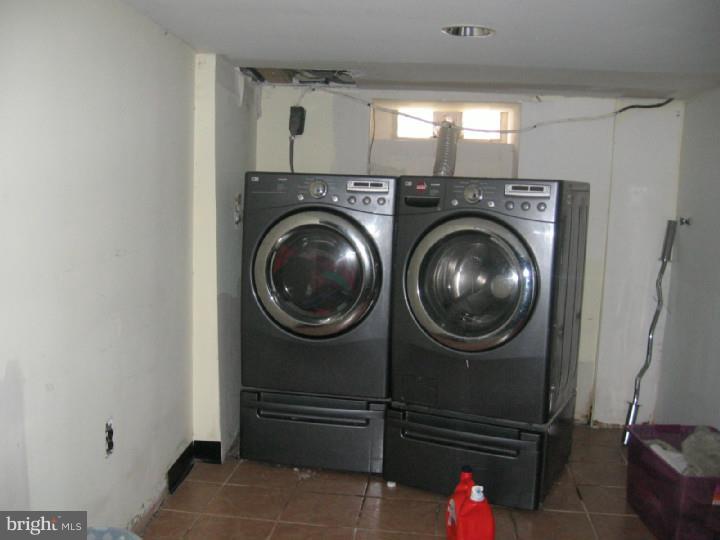 7007 Hilltop Road Upper Darby, PA 19082 - Photo 15 of 20 a utility room with dryer and washer