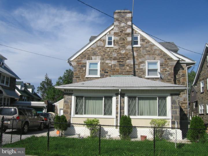 7007 Hilltop Road Upper Darby, PA 19082 - Photo 20 of 20 a front view of a house with a yard