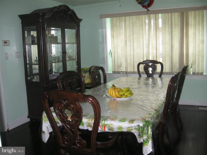 7007 Hilltop Road Upper Darby, PA 19082 - Photo 9 of 20 a view of a dining room with furniture and window