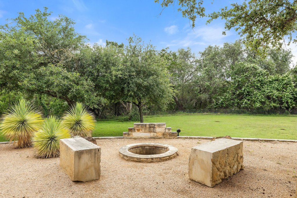 12135 Fitzhugh Road Austin, TX 78736 - Photo 30 of 30 a view of a swimming pool and a yard