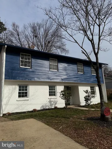 a front view of a house with yard