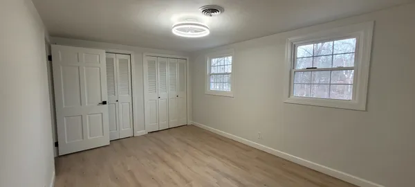 an empty room with windows