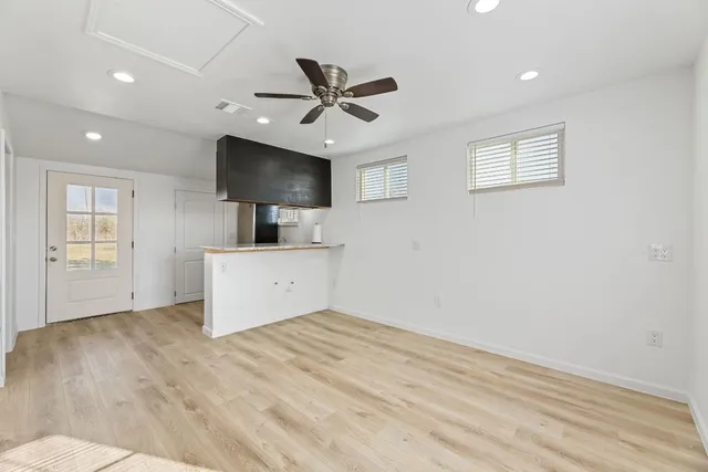 a view of a livingroom with a flat screen tv