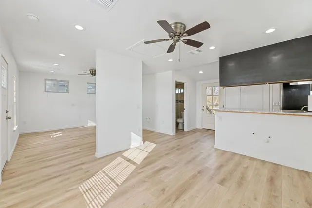 a view of a livingroom with a ceiling fan