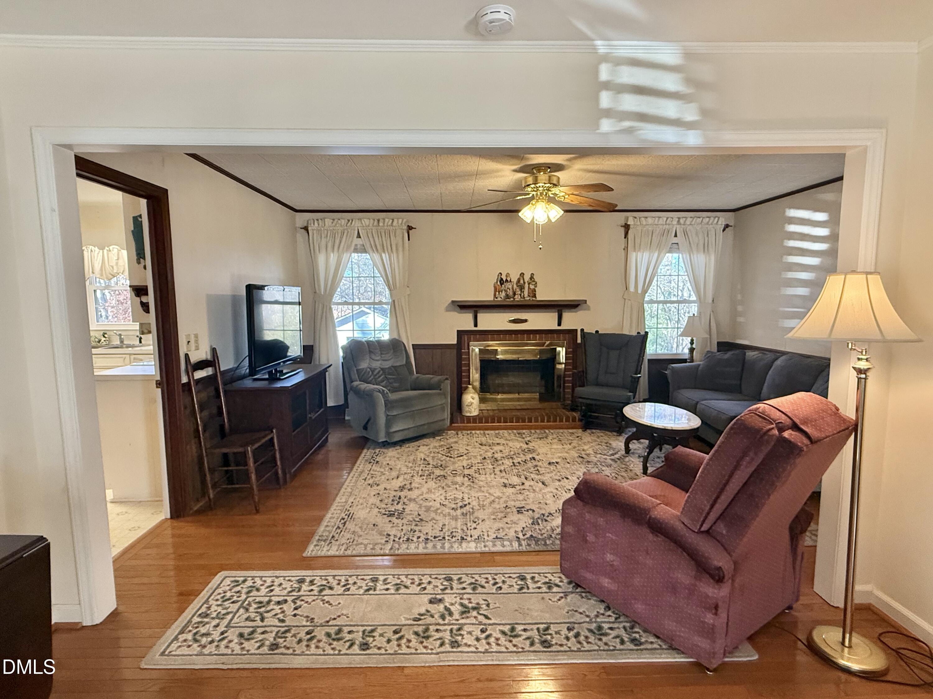 424 Tanglewood Circle Roxboro, NC 27573 - Photo 23 of 47 a living room with furniture rug and window