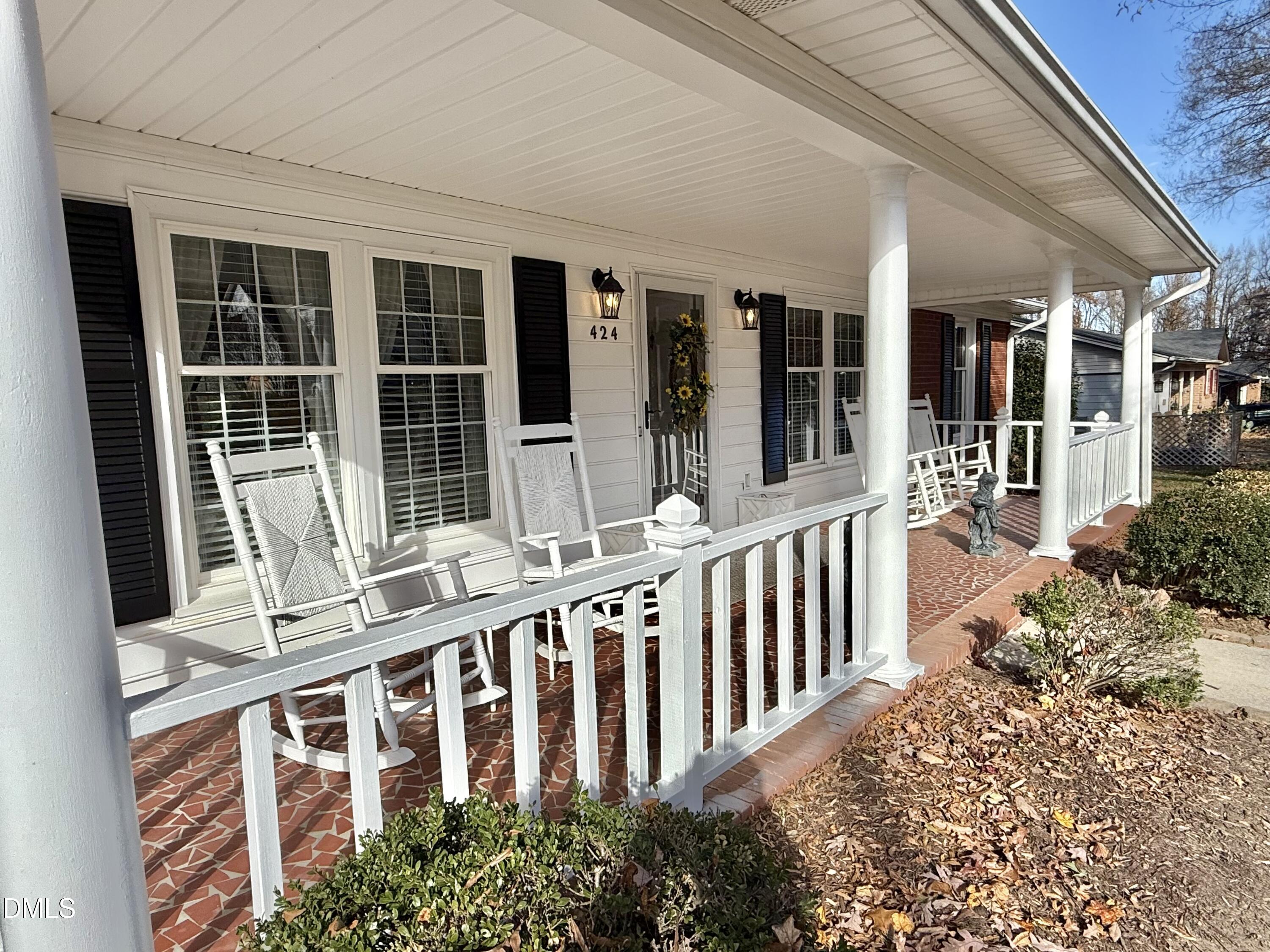 424 Tanglewood Circle Roxboro, NC 27573 - Photo 3 of 47 front view of a house with large windows