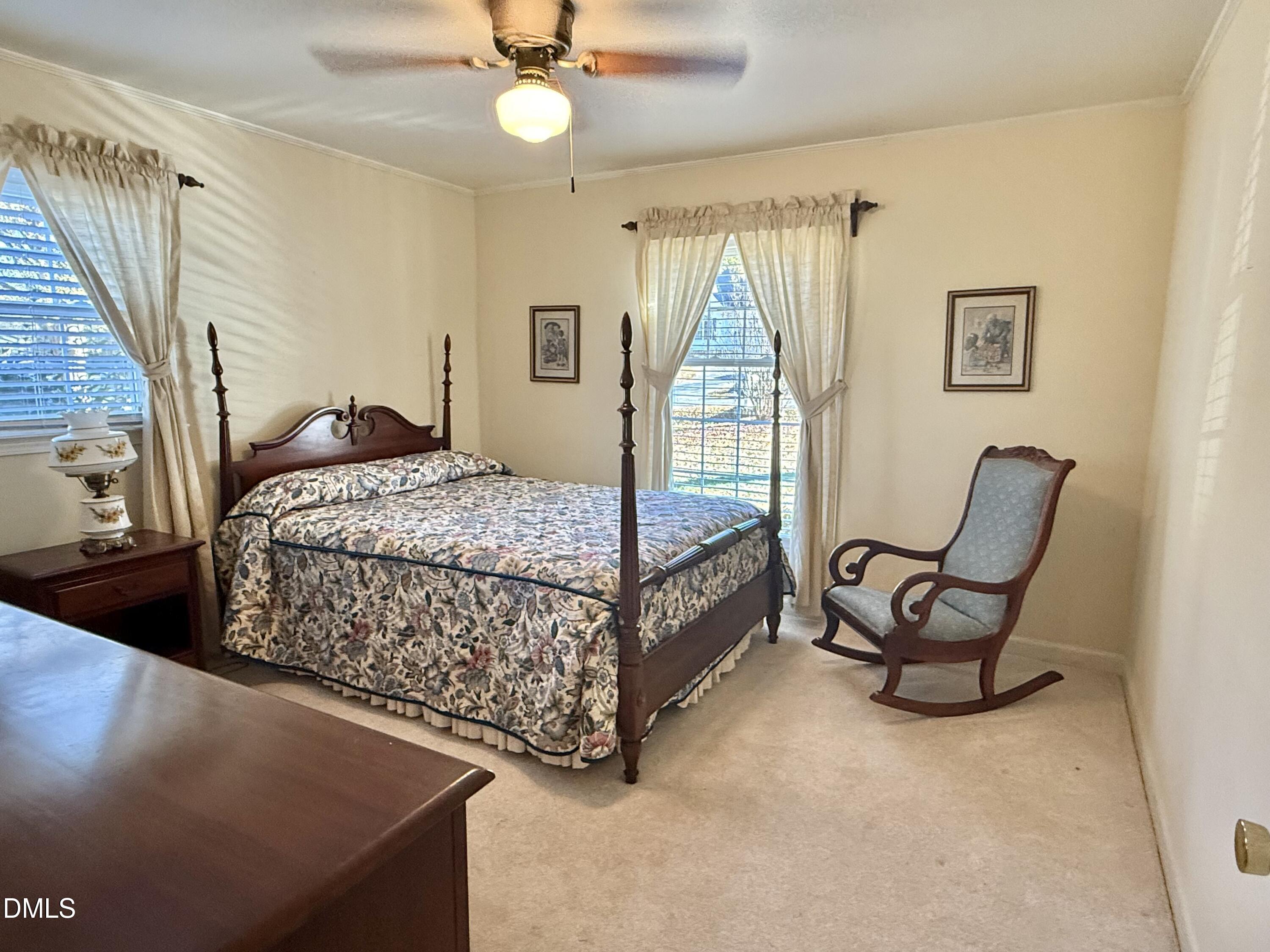 424 Tanglewood Circle Roxboro, NC 27573 - Photo 35 of 47 a bedroom with a bed and window