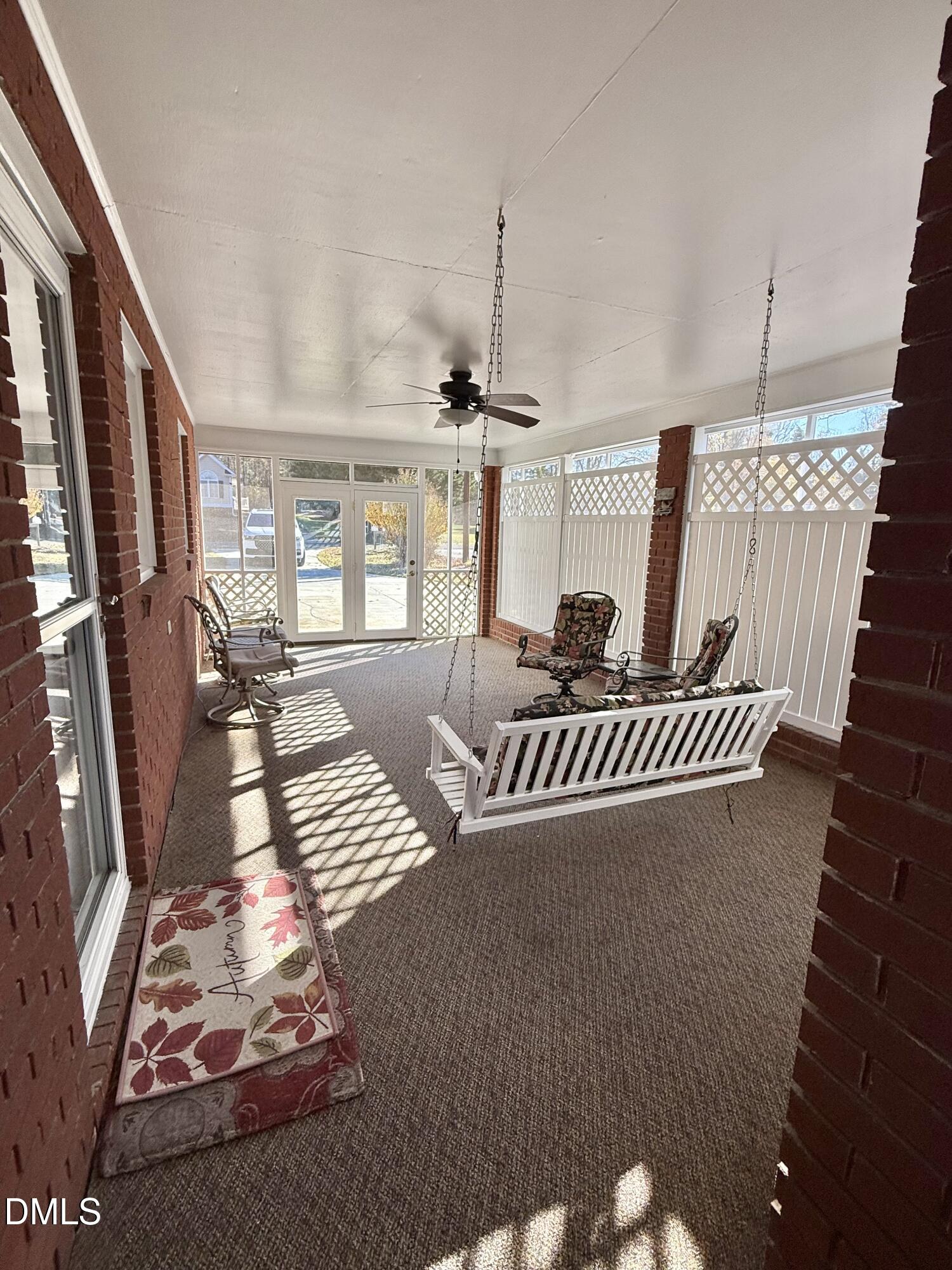 424 Tanglewood Circle Roxboro, NC 27573 - Photo 38 of 47 a view of entryway livingroom and hall with wooden floor