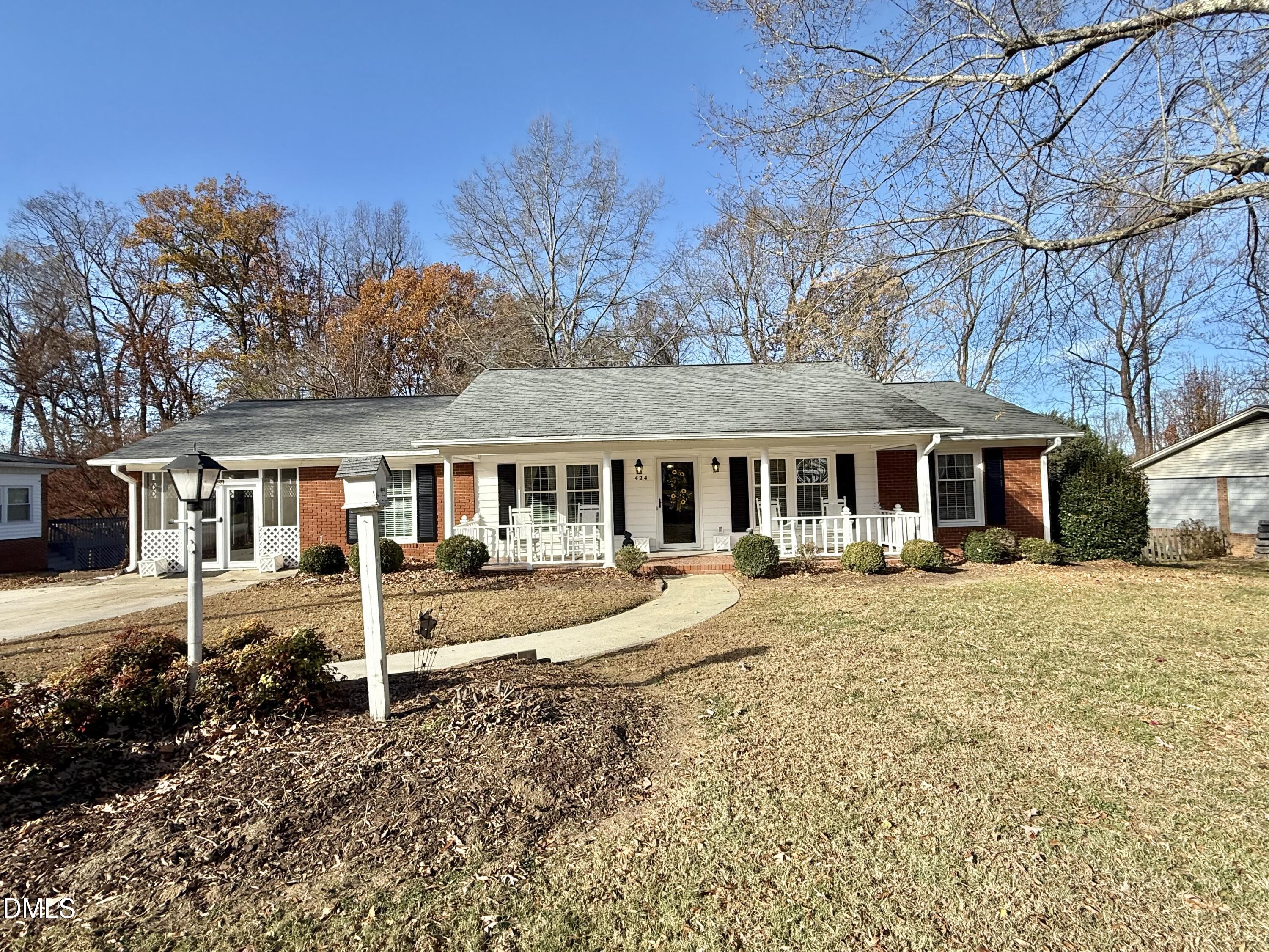 424 Tanglewood Circle Roxboro, NC 27573 - Photo 41 of 47 front view of a house with a yard