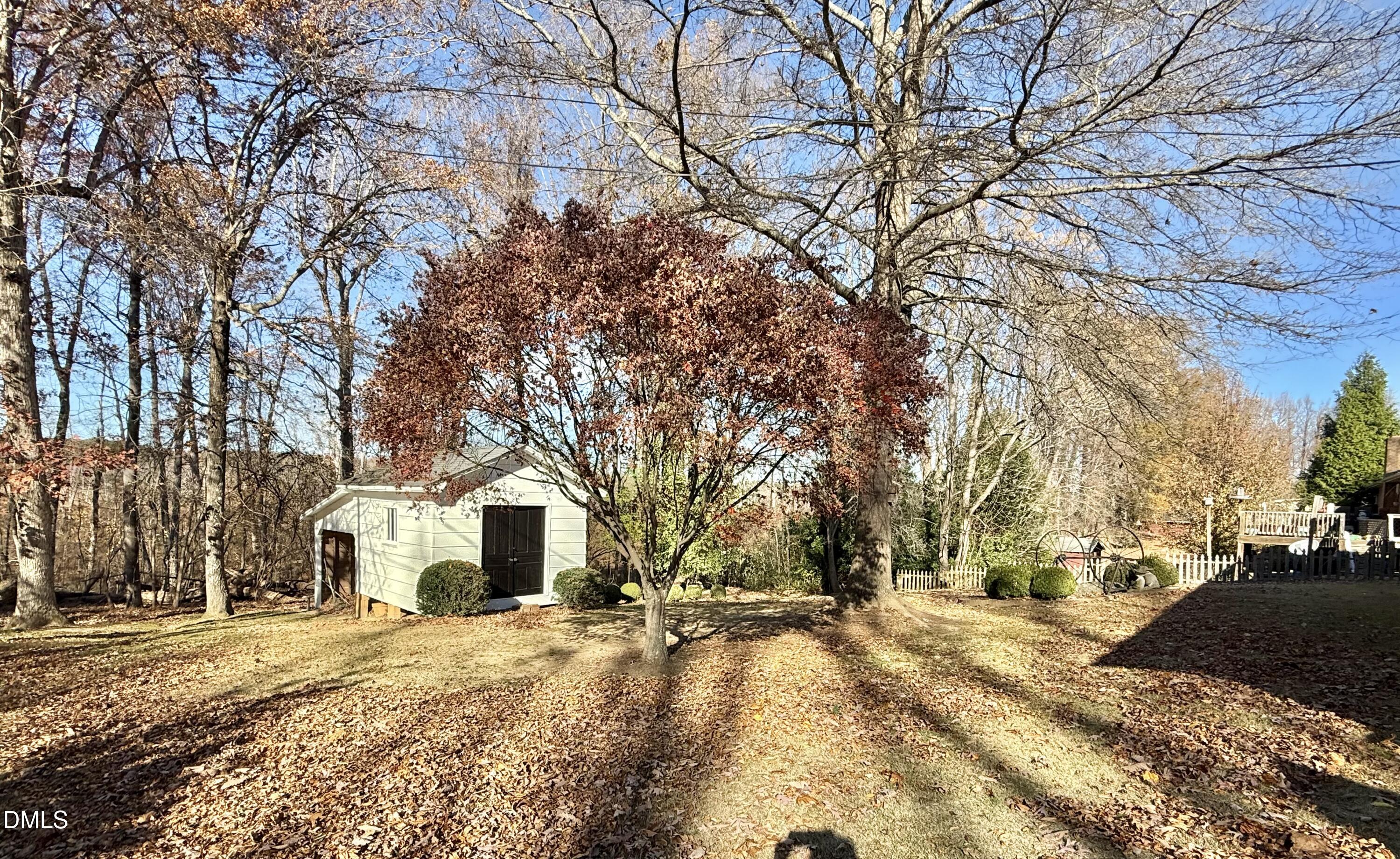 424 Tanglewood Circle Roxboro, NC 27573 - Photo 43 of 47 a front view of a house with a yard covered in snow