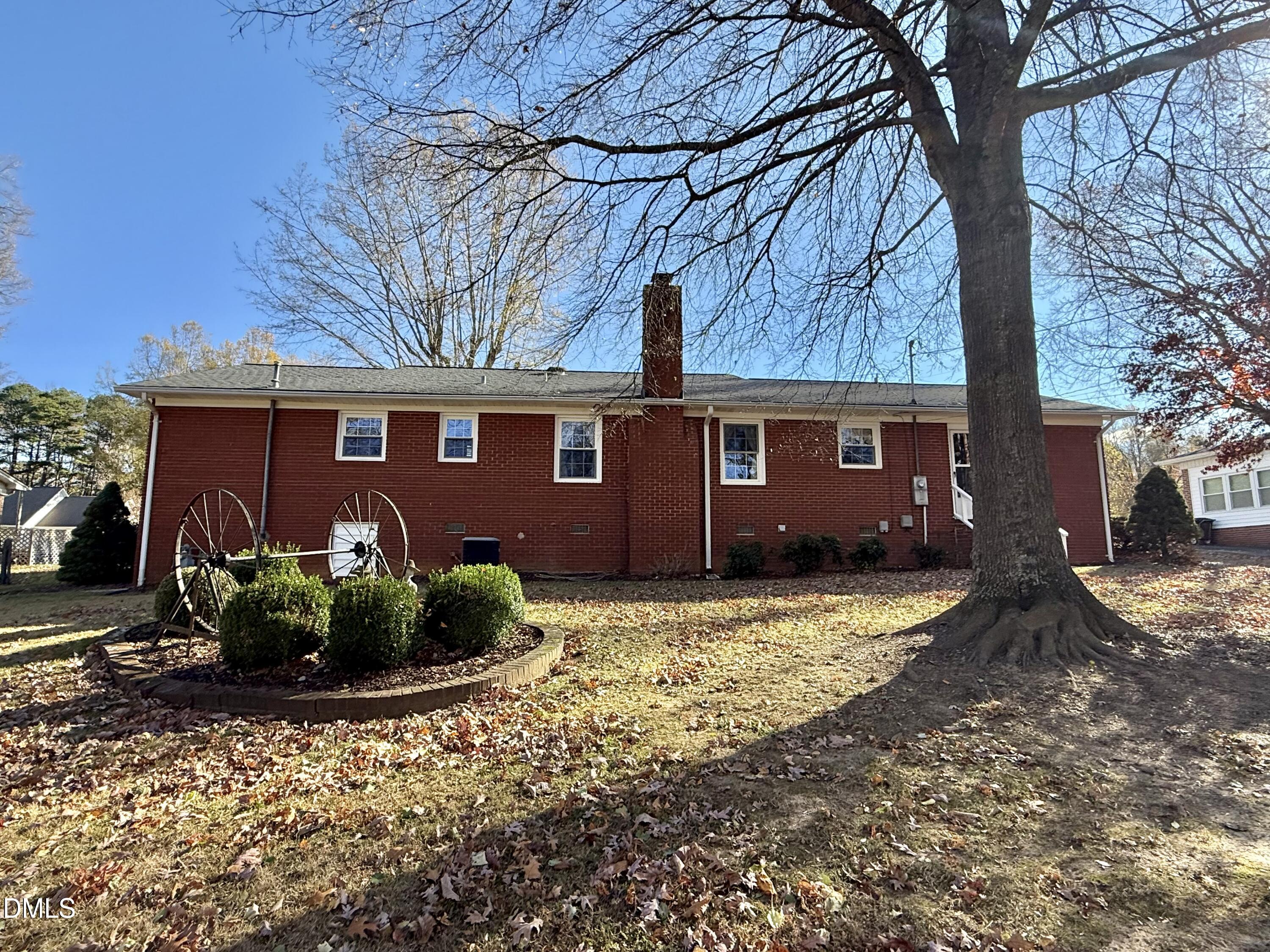 424 Tanglewood Circle Roxboro, NC 27573 - Photo 46 of 47 a view of a house with a yard