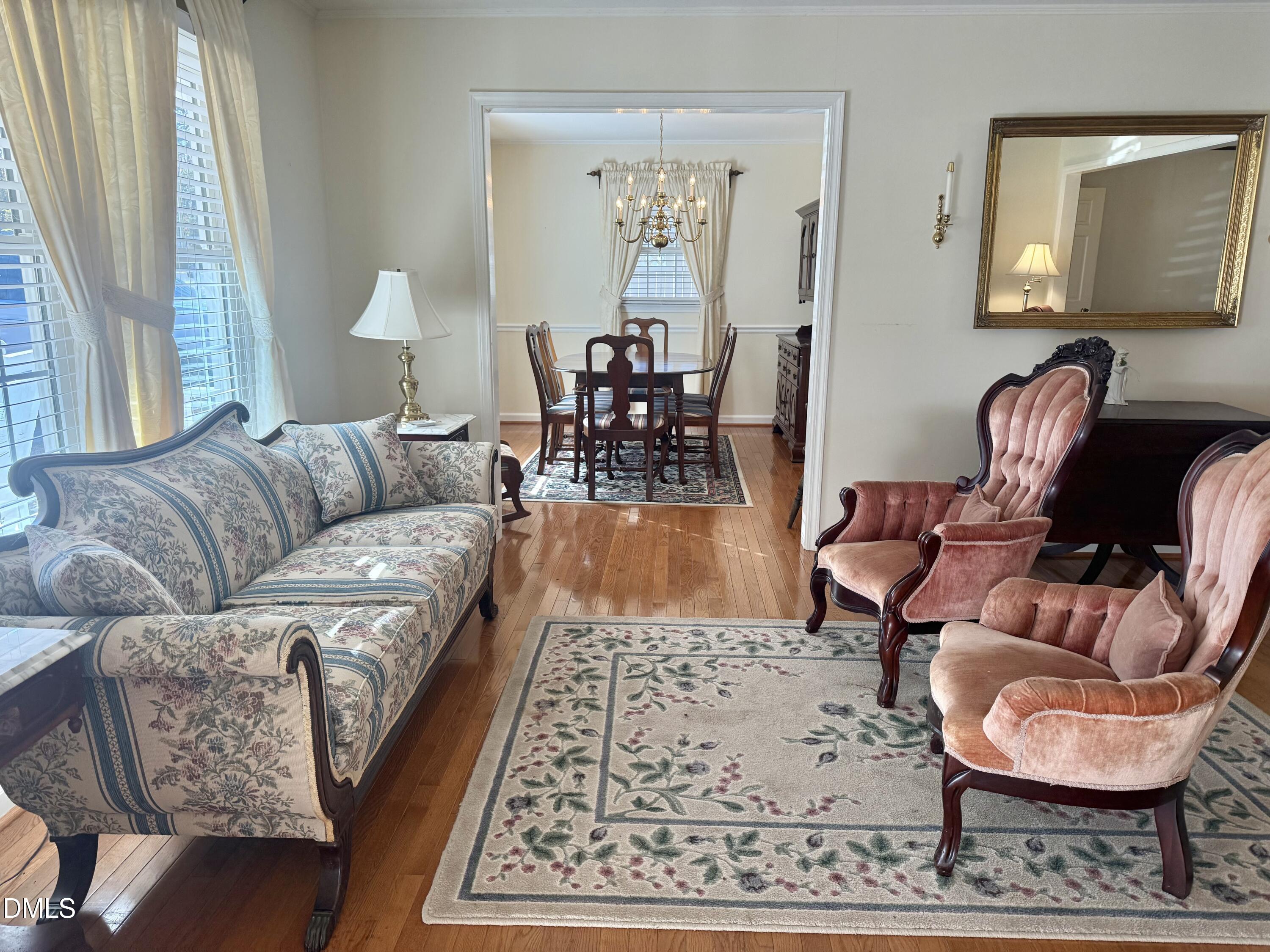 424 Tanglewood Circle Roxboro, NC 27573 - Photo 5 of 47 a living room with furniture and a rug