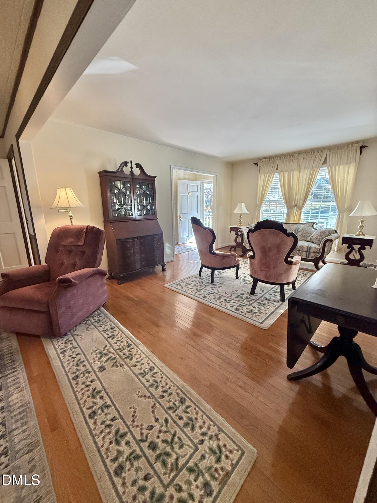 424 Tanglewood Circle Roxboro, NC 27573 - Photo 9 of 47 a living room with furniture rug and window