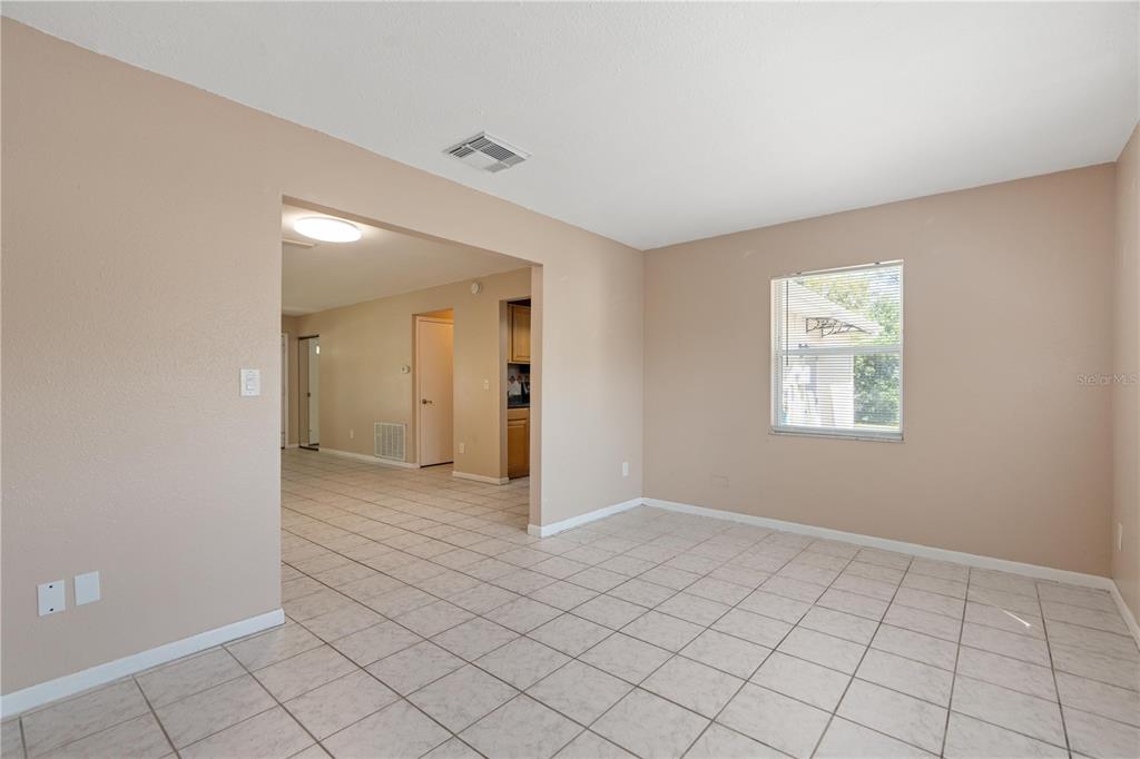 4008 Windswept Avenue Spring Hill, FL 34606 - Photo 13 of 32 a view of an empty room and window