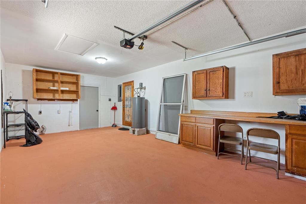 4008 Windswept Avenue Spring Hill, FL 34606 - Photo 28 of 32 a view of a livingroom with workspace and windows