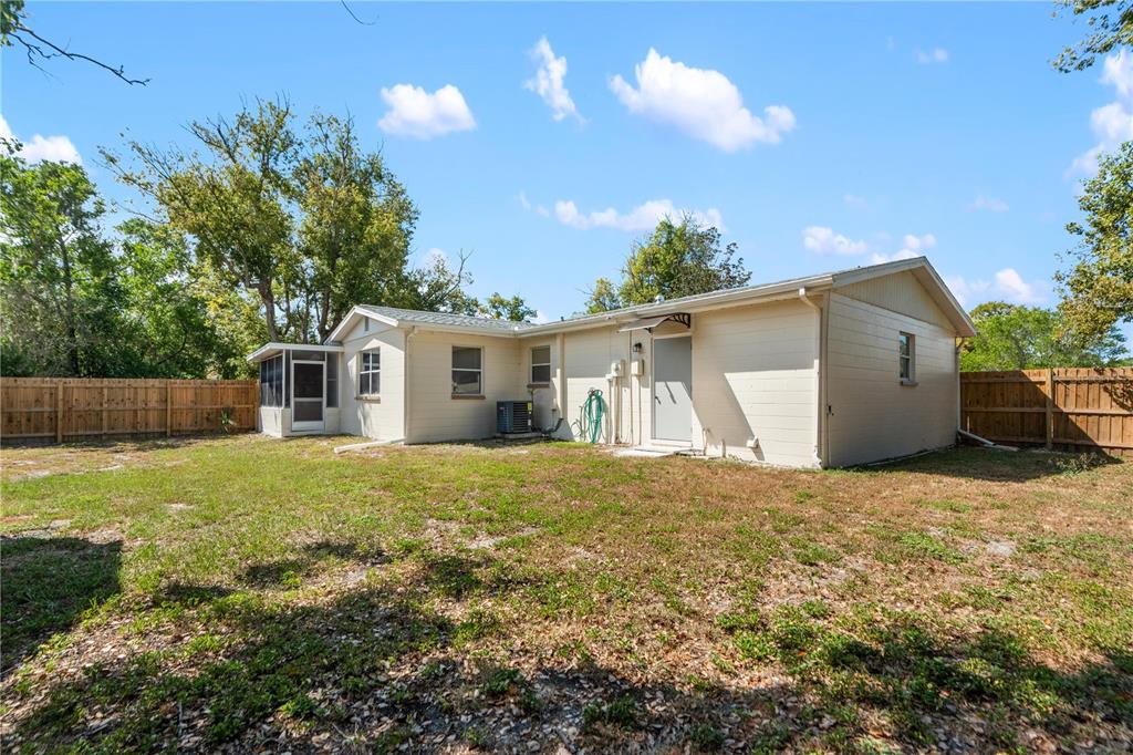 4008 Windswept Avenue Spring Hill, FL 34606 - Photo 32 of 32 a view of a house with backyard and garden